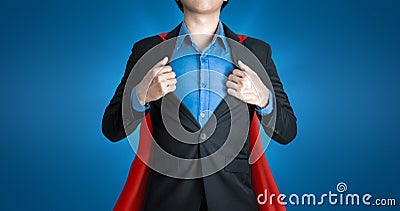 Super business man wears black suits and red robes with super heroes coaching concept on shine blue background and smart. Stock Photo