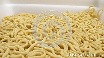 Super close details of dry instant noodles. background texture Stock Photo