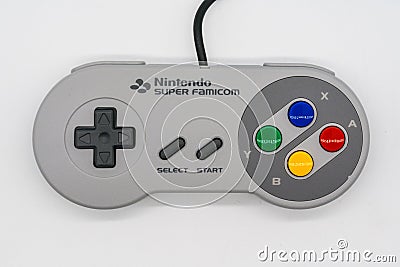 Super Famicom Mini Controller, Vintage game console by Nintendo. Editorial Stock Photo