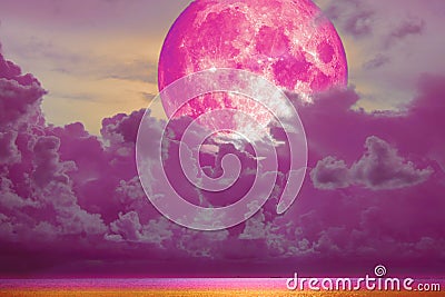 super full pink moon back magenta cloud over the sea Stock Photo