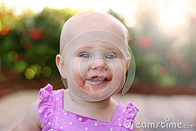 Super Happy Smiling Baby Girl Outside Stock Photo