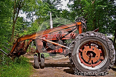 Super M Farmall with a front end loader Editorial Stock Photo