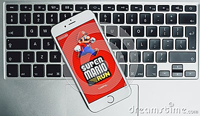 Super Mario Run game on iPhone Editorial Stock Photo