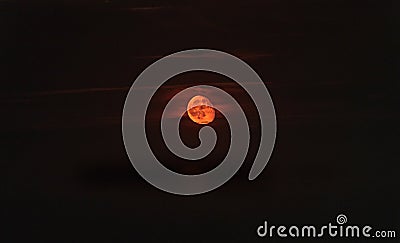 Super red moon in night time, dark light sky, close up Stock Photo