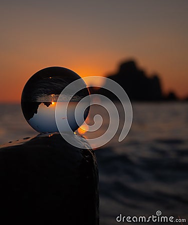 Super sunset in the south of sardinia in front of the stack of sugar loaf Stock Photo