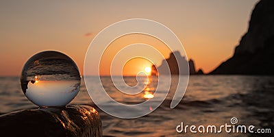 Super sunset in the south of sardinia in front of the stack of sugar loaf Stock Photo