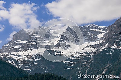 Superbly visible mountainous rock layers of alpine peaks covered with snow, Ville d`Anaunia, Trentino, Italy Stock Photo