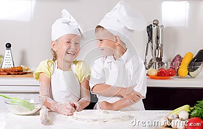 Supercilious little boy chef Stock Photo