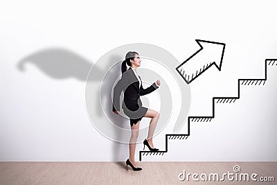 Superhero business woman with stair Stock Photo