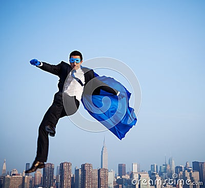 Superhero Businessman Over New York City Stock Photo