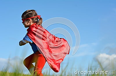 Superhero child - girl power Stock Photo