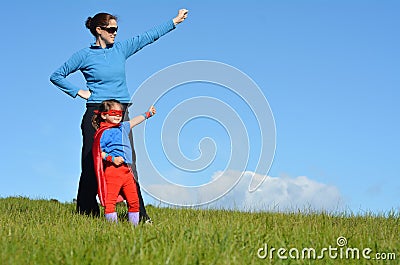 Superhero mother and child - girl power Stock Photo