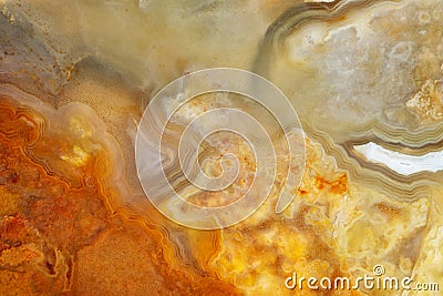 Supermacro image of translucent light agate in orange siliceous rock Stock Photo