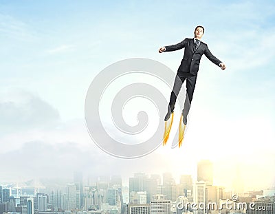 Superman in sky Stock Photo