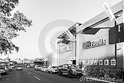 Supermarket, people, vehicles, in Prieska. Monochrome Editorial Stock Photo