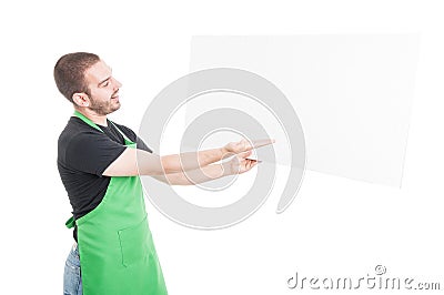 Supermarket seller showing and holding big advertising board Stock Photo