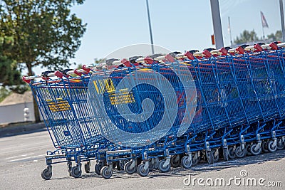 Supermarket shopping carts of the French brand hyper U Editorial Stock Photo