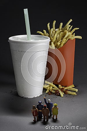 Supersize epidemic - people in line for fast food soda and fries Stock Photo