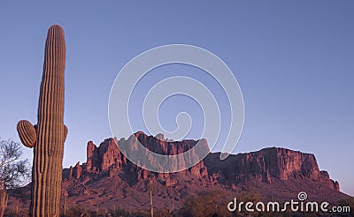 Superstition Mountain glows red, Phoenix, Az Stock Photo