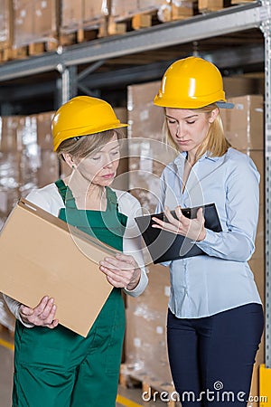 Supervision in manufacturing plant Stock Photo