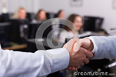 Supervisor thanking staff member Stock Photo