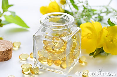 Supplement with evening primrose flowers Stock Photo