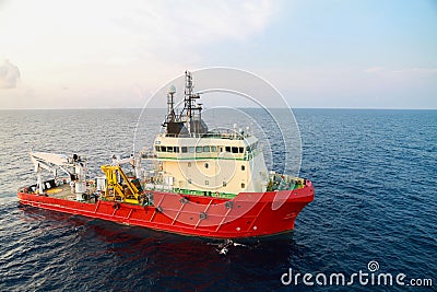 Supply boat operation shipping any cargo or basket to offshore. Support transfer any cargo to offshore oil and gas industry Stock Photo