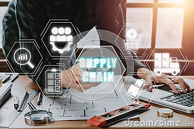 Engineer man working on laptop computer and smart phone with supply chain icon on virtual screen Stock Photo