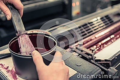 Supplying ink in an offset printing machine Stock Photo