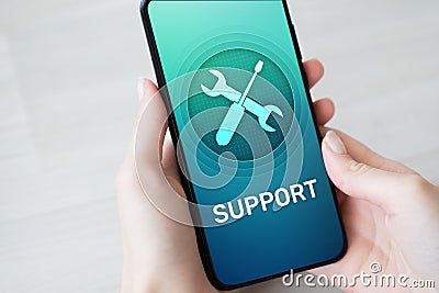 Support, Customer service icon on mobile phone screen. Call center, 24x7 assistance. Stock Photo