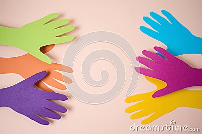 Support diverse community concept with paper hands Stock Photo