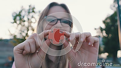 Support for healthcare frontliners. Young woman holding red cross Editorial Stock Photo