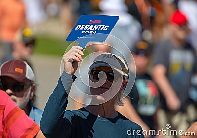 Supporter of Florida Governor Ron DeSantis Holding Up a Sign Editorial Stock Photo