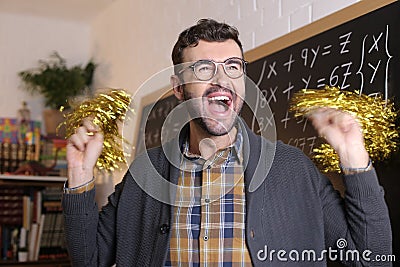 Supportive math teacher cheerleading with pompoms Stock Photo