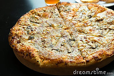 Supreme chicken bacon mushroom pizza Stock Photo