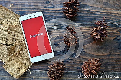 supreme on smartphone, popular brand in the world wide Editorial Stock Photo