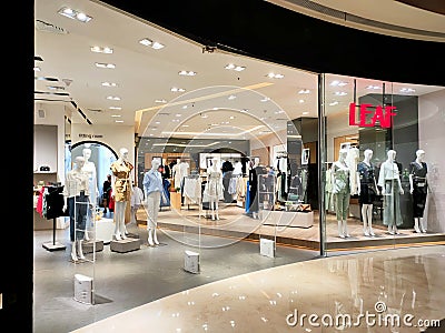 Clothing and Fashion store with a modern contemporary interior arrangement Editorial Stock Photo