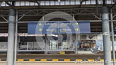 Signboards contain the names of major cities along with the distances served by trains Editorial Stock Photo