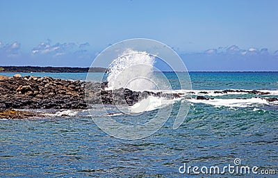 Surf Crashing on volcanic rock near Makena Cove on Maui, Hawaii Stock Photo