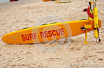 Surf rescue board on a white sand beach Stock Photo