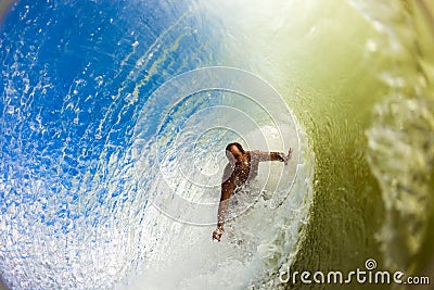 Surf Rider Inside Hollow Wave Editorial Stock Photo