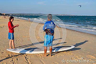 Surf school students training on beach Editorial Stock Photo