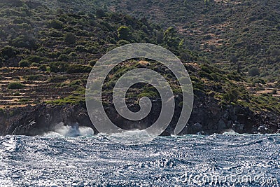 Surf waves hit shores of the island Stock Photo