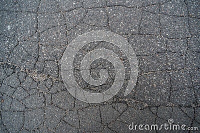 The surface of the coated asphalt lot of cracks on top Stock Photo