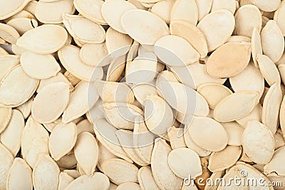 Surface coated with pumpkin seeds Stock Photo