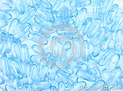 Surface coated with softgel pills Stock Photo