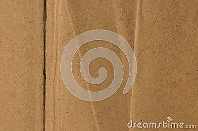 Surface of cut and torn sheet brown color old and vintage cardboard paper box. Abstract texture background close up. Natural Stock Photo