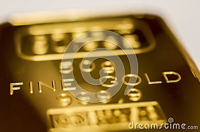 The surface of gold bullion. The texture of the surface of the minted gold bar Stock Photo