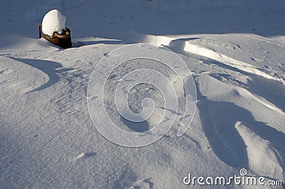 Snow fields covered with intricate patterns from the wind, a copy space, close-up. Stock Photo