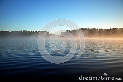 Surface texture of a forest lake. Background, surface water. Lake covered in mist Stock Photo